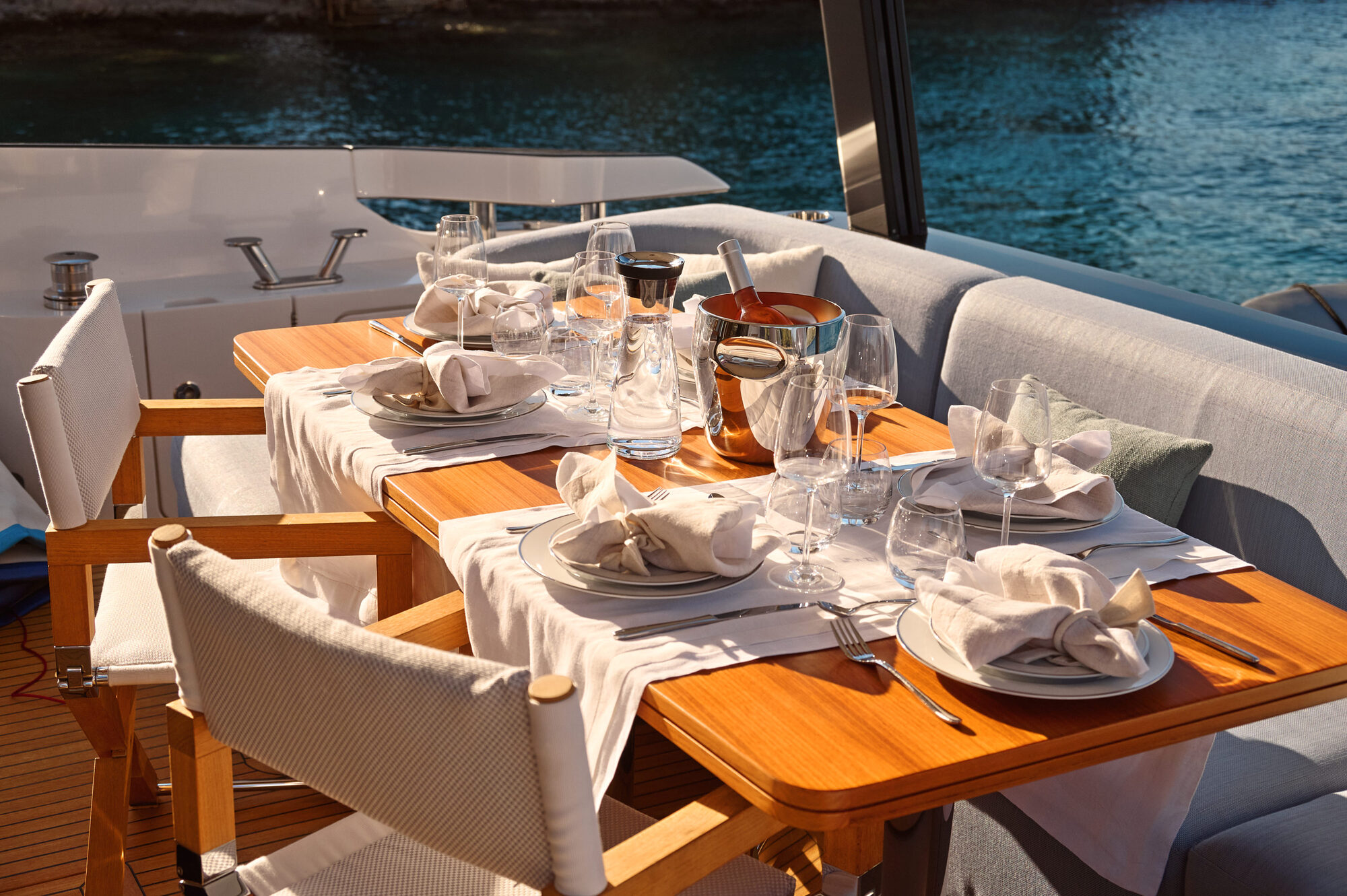 A detail of the aft dining table, set for dinner