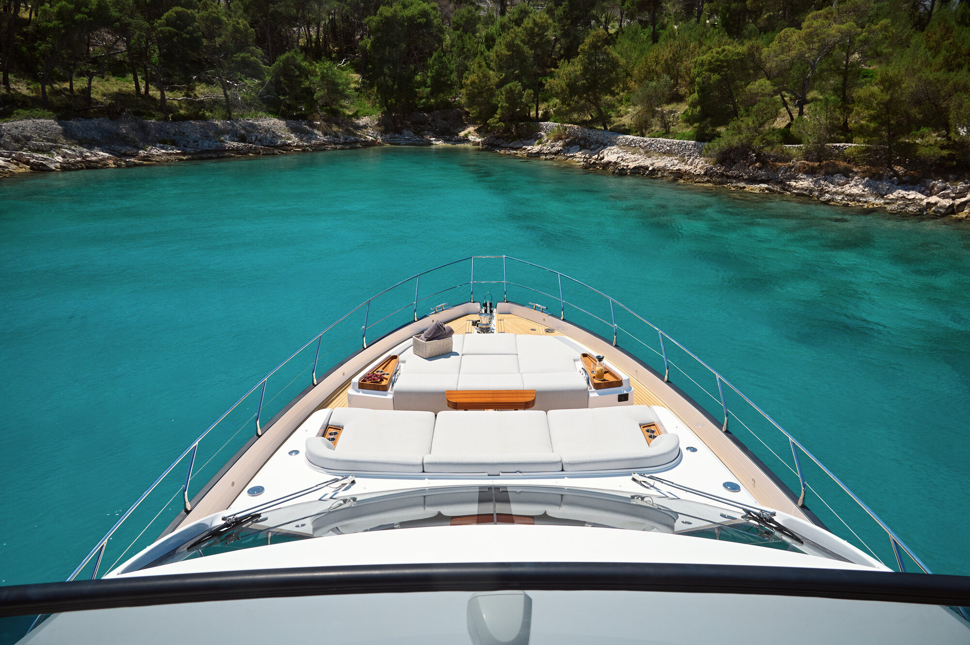 Pangea anchored in a quiet cove seen from the foredeck
