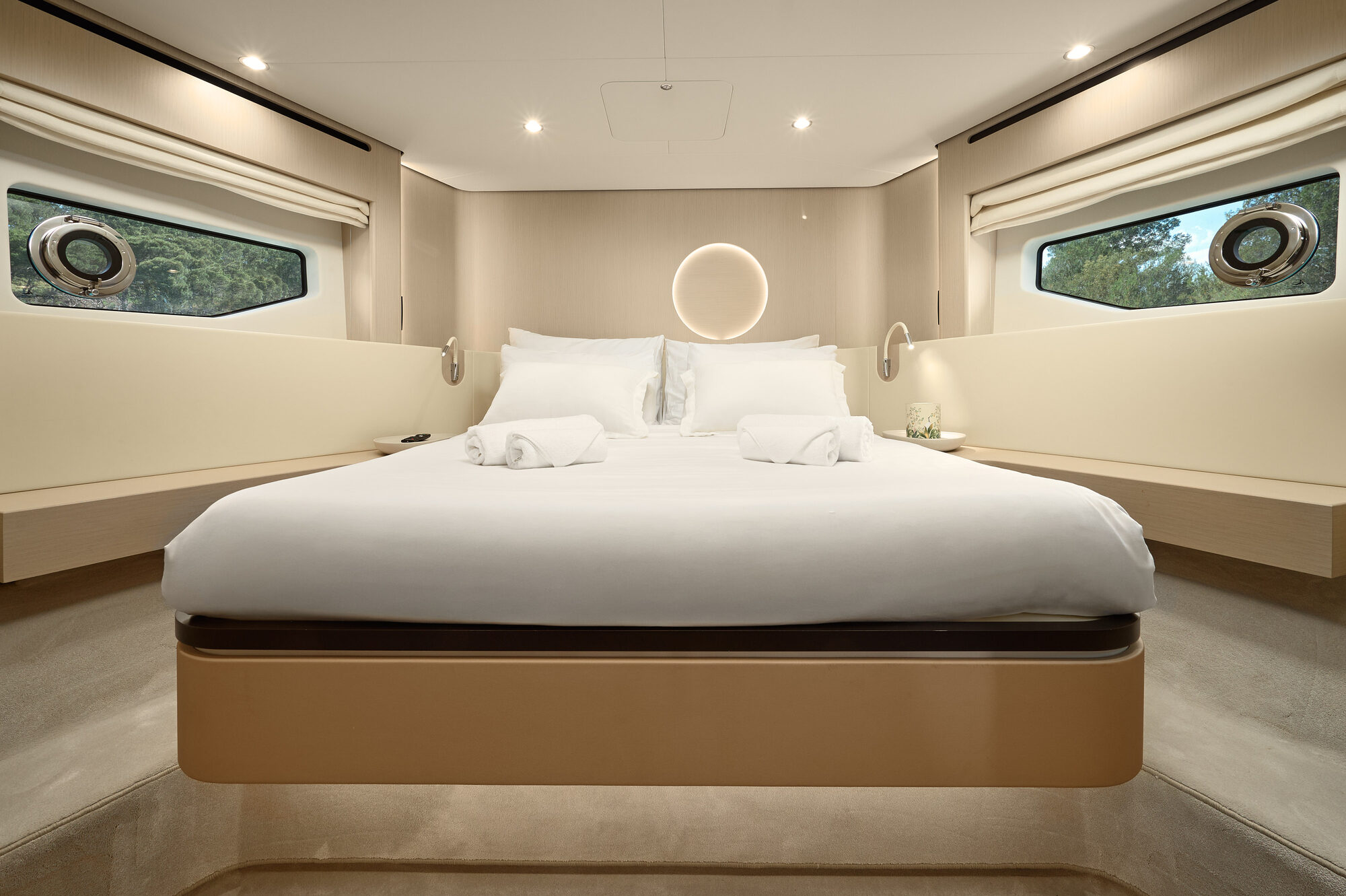 Full-beam master cabin with hull windows at sea level